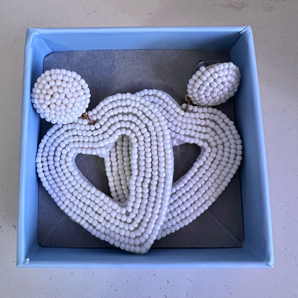 Embroidered white heart shaped earrings